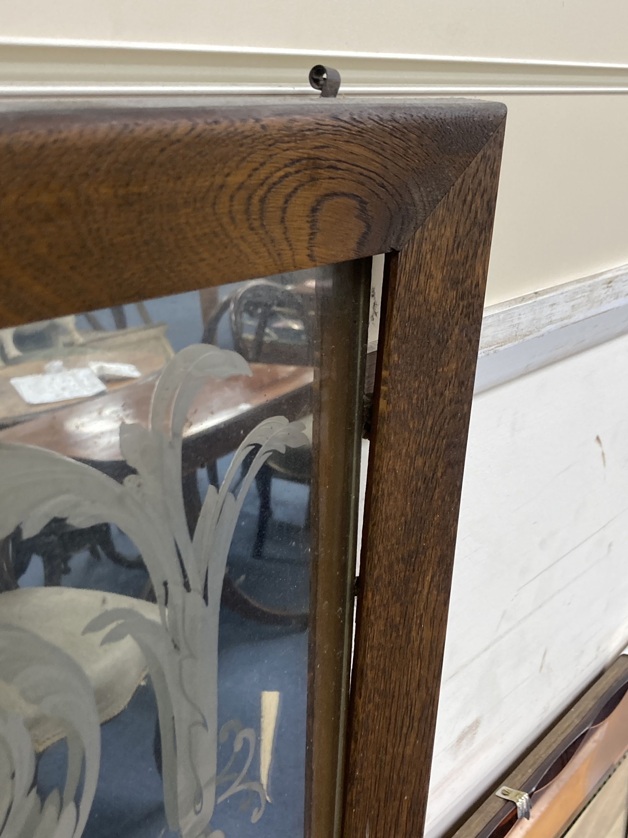 A pair of Victorian oak framed etched glass panels, width 55cm height 144cm